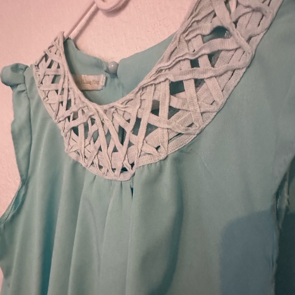 A blouse by liang E L liang Ying size small